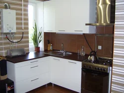 Corner Kitchen With Gas Water Heater Photo