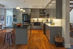 Gray kitchen brown floor in the interior