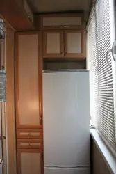 Refrigerator on the kitchen balcony photo