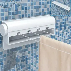 Wall-mounted dryer in the bathroom interior