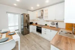 Dairy kitchen with wooden countertop photo