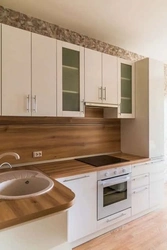 Dairy kitchen with wooden countertop photo