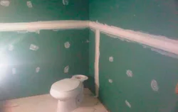 Photo of all the drywall in the bathroom