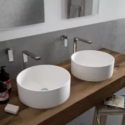Overhead sinks in the bathroom interior photo