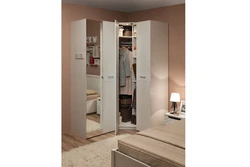 Small Corner Wardrobe In The Bedroom For Clothes Photo
