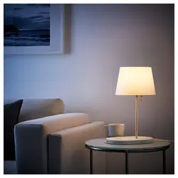 Table lamps in the living room interior photo