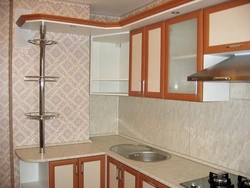 Kitchen design with a niche in the wall in the corner