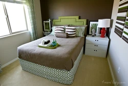 Bedroom design with a bed along the wall photo