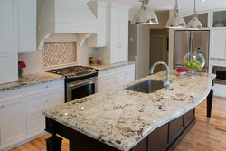 White granite countertop in the kitchen interior