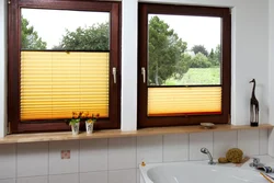 Photo of blinds in the bathroom on the window photo