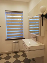 Photo of blinds in the bathroom on the window photo