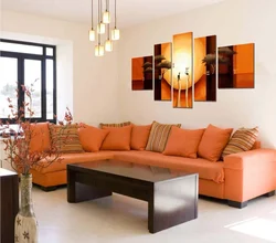 Orange sofa in the interior of the living room photo