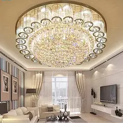 Ceiling chandelier in the living room with a low ceiling photo