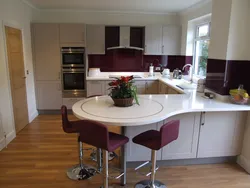 Photo of a small kitchen with a dining table