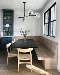 Photo of a small kitchen with a dining table