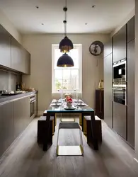 Photo of a small kitchen with a dining table