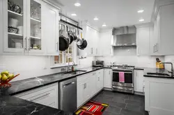 Kitchen With A Gray Countertop And Apron In The Interior Photo