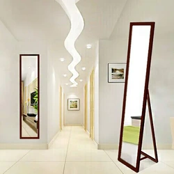 Full-length mirror in the hallway on the wall photo
