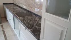 White Marquina marble in the kitchen interior