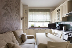 Square kitchen design with sofa photo