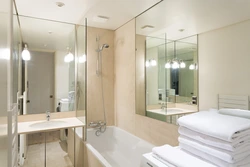 Photo Of A Bathtub With A Mirror