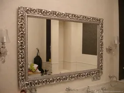 Photo of a bathtub with a mirror