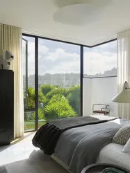 Интерьер спальни с панорамным окном