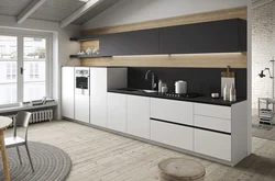 Design of a straight kitchen in a modern style with a refrigerator