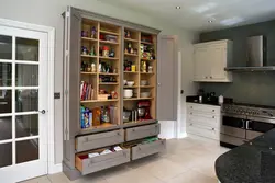 Narrow cabinets in the kitchen interior