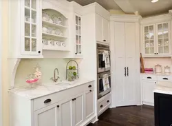 Narrow cabinets in the kitchen interior