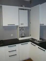 Kitchen design with gas boiler on the floor