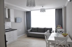 Kitchen design with gray sofa photo