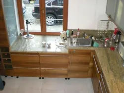 Kitchens with a window if the window is below the countertop photo