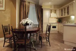 White kitchen interior with brown table