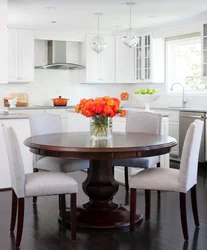 White Kitchen Interior With Brown Table