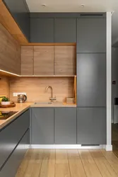 Photo Of A Gray Kitchen Combined With Wood