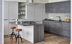 Photo Of A Gray Kitchen Combined With Wood