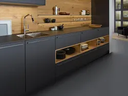 Dark gray kitchen with wood photo