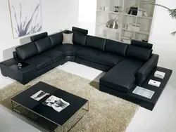 Темный угловой диван в гостиной фото