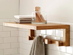 Bathrooms with wooden shelves photo