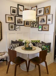 Photo of a round table for the kitchen against the wall