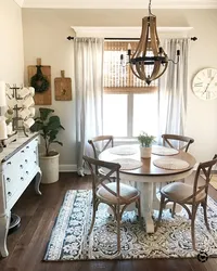 Photo Of A Round Table For The Kitchen Against The Wall