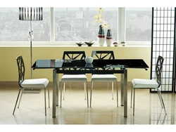 Kitchen with black glass table photo