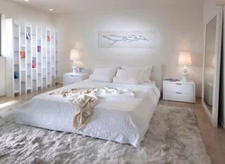 Light bed in the bedroom interior photo