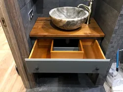 Bathroom design with countertop sink