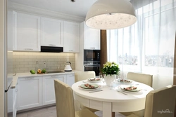 Кухня с белым круглым столом фото