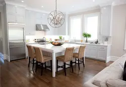 Kitchen with white round table photo