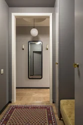 Hallway With Front Door With Mirror Photo
