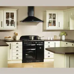 Black gas stove in the kitchen interior