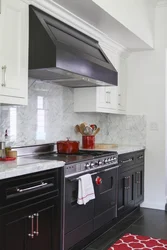 Black gas stove in the kitchen interior